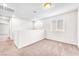 Spacious loft area with carpet, natural light, and neutral walls, perfect for versatile living at 9198 Rolling Sky Dr, Las Vegas, NV 89178