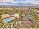 An aerial view showcasing the community's pool, tennis courts, recreation center, and well-maintained grounds at 9437 January Dr, Las Vegas, NV 89134