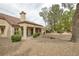 The backyard features low-maintenance landscaping, a covered patio, and a serene atmosphere for relaxation at 9437 January Dr, Las Vegas, NV 89134