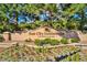 Welcome to Sun City Summerlin, a Del Webb Community, with vibrant landscaping and a beautiful entrance sign at 9437 January Dr, Las Vegas, NV 89134