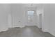 Bright open-concept living area features tall ceilings, and modern flooring at 9437 January Dr, Las Vegas, NV 89134
