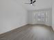 Bright living room with bay window, shutters and light wood flooring at 9437 January Dr, Las Vegas, NV 89134