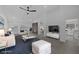 Staged living room with open concept view to kitchen and stylish decor at 9437 January Dr, Las Vegas, NV 89134