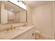 Modern bathroom featuring double sinks, and sleek fixtures at 955 Leadville Meadows Dr, Henderson, NV 89052