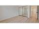 Bedroom with closet and light filled with wood floors at 955 Leadville Meadows Dr, Henderson, NV 89052