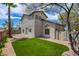 Two story home featuring artificial turf, desert landscaping, stucco exterior, and tile roof at 955 Leadville Meadows Dr, Henderson, NV 89052
