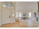 Bright, open-concept living room with modern decor, light wood floors, and ample natural light at 955 Leadville Meadows Dr, Henderson, NV 89052