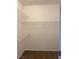 Walk-in closet featuring carpeted floors and wire shelving for organization at 9839 Brook Canyon Dr, Las Vegas, NV 89147