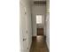 Neutral colored hallway with tile floors at 9839 Brook Canyon Dr, Las Vegas, NV 89147
