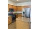Kitchen with stainless steel appliances and stone countertops at 9839 Brook Canyon Dr, Las Vegas, NV 89147