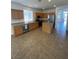 Contemporary kitchen with stainless steel appliances, granite countertops, and ample cabinetry at 9839 Brook Canyon Dr, Las Vegas, NV 89147