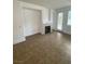 Comfortable living room with a fireplace and access to the outdoor patio at 9839 Brook Canyon Dr, Las Vegas, NV 89147