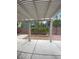 View of the covered patio with a small garden area at 9839 Brook Canyon Dr, Las Vegas, NV 89147