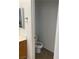 View of a standard toilet in a toilet room, within a bathroom featuring tile flooring at 9839 Brook Canyon Dr, Las Vegas, NV 89147
