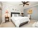 Cozy bedroom featuring decorative walls, soft carpet, and a comfortable bed with stylish decor at 9953 Fletcher Peak Ave, Las Vegas, NV 89178