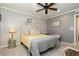 Bright bedroom with plantation shutters and ceiling fan at 9953 Fletcher Peak Ave, Las Vegas, NV 89178