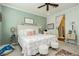 Comfortable bedroom with bright walls and shuttered windows that provides ample natural light at 9953 Fletcher Peak Ave, Las Vegas, NV 89178