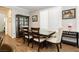 Elegant dining room with a large window and shutter, perfect for Gathering gatherings and entertaining at 9953 Fletcher Peak Ave, Las Vegas, NV 89178