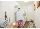 Laundry room with washer, dryer, storage, and bench at 9953 Fletcher Peak Ave, Las Vegas, NV 89178