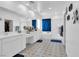 Bright bathroom featuring tile floors, a bathtub and shower, and a vanity with double sinks at , North Las Vegas, NV 89031