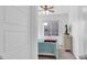Bright bedroom with a ceiling fan, large window, and a neutral color scheme with comfy textiles at , North Las Vegas, NV 89031