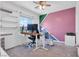 Bright office space with modern desk, chair, and storage; brightly lit by natural light at , North Las Vegas, NV 89031