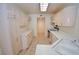 Bright kitchen with tile floors, ample cabinet space, and modern appliances creating a functional cooking area at 1000 Grammy Dr, Las Vegas, NV 89145
