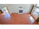 Bright living room with high ceilings, fireplace, wood floors, and large window for lots of light at 1000 Grammy Dr, Las Vegas, NV 89145