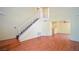 Spacious living room featuring stairs, hardwood floors, and bright natural light at 1000 Grammy Dr, Las Vegas, NV 89145