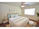 Well-furnished staged bedroom with a comfortable bed, stylish decor, and a bright, airy feel at 1000 Grammy Dr, Las Vegas, NV 89145