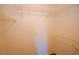 Clean, walk-in closet with wire shelves, offering ample storage space at 1000 Grammy Dr, Las Vegas, NV 89145