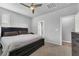 Spacious bedroom features neutral walls, a ceiling fan, and access to an en-suite bathroom at 1024 Fishing St, Henderson, NV 89011