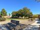Community park featuring lush landscaping, mature trees, and walking paths at 1024 Fishing St, Henderson, NV 89011