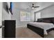 The main bedroom, featuring a large bed, modern design, and bright, natural light at 1024 Fishing St, Henderson, NV 89011