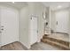 Hallway features tile flooring, storage, and entry access at 10324 Lettuce Leaf St, Las Vegas, NV 89183