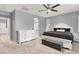 Main bedroom with a comfortable bed and stylish furnishings at 10385 Kern Ridge St, Las Vegas, NV 89178