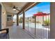 Covered patio overlooks a sparkling pool, offering a perfect outdoor entertainment space at 10385 Kern Ridge St, Las Vegas, NV 89178