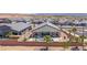 This home features a private pool, covered patio, desert landscaping, and is located in a planned community at 1357 Manassas Rdg Rdg, Mesquite, NV 89027