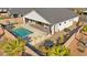 Aerial view of a refreshing pool and backyard, surrounded by desert landscaping at 1357 Manassas Rdg Rdg, Mesquite, NV 89027