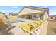 Beautiful backyard features an in-ground pool, lounge chairs, and desert landscaping at 1357 Manassas Rdg Rdg, Mesquite, NV 89027