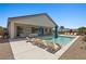 Spacious backyard with pool, lounge chairs, and covered patio perfect for outdoor living at 1357 Manassas Rdg Rdg, Mesquite, NV 89027