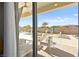 Beautiful backyard featuring a pool, lounge seating, palm trees, and scenic desert views at 1357 Manassas Rdg Rdg, Mesquite, NV 89027