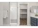 Bathroom featuring modern shower, vanity, and walk-in closet at 1357 Manassas Rdg Rdg, Mesquite, NV 89027