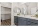 Bathroom with modern vanity, ample storage, and access to walk in shower and closet at 1357 Manassas Rdg Rdg, Mesquite, NV 89027