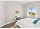 Bright bedroom featuring a large window and stylish decor at 1357 Manassas Rdg Rdg, Mesquite, NV 89027