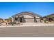 Beautiful single-story home features a three car garage, desert landscaping, and a modern architectural design at 1357 Manassas Rdg Rdg, Mesquite, NV 89027