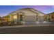 Charming single-story home with a two-car garage and desert landscaping at 1357 Manassas Rdg Rdg, Mesquite, NV 89027