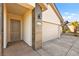 Modern home showcasing a stylish front door, stone accent pillar, and well-manicured landscaping and drive at 1357 Manassas Rdg Rdg, Mesquite, NV 89027