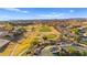 An aerial of a gorgeous golf course situated in a community with nearby houses and a clubhouse at 1357 Manassas Rdg Rdg, Mesquite, NV 89027