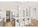 Kitchen with a large island, seating, stainless steel appliances, and modern finishes at 1357 Manassas Rdg Rdg, Mesquite, NV 89027